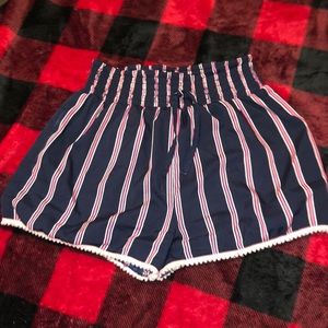 pink, white, and blue ruffle shorts